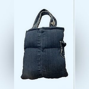 This is a denim mini puffer tote bag.